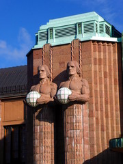 Fragment of facade of Helsinki main railway station with sculptures