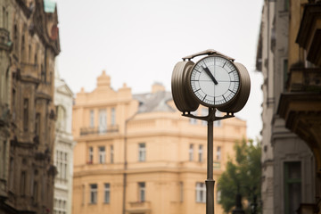 Fototapeta na wymiar Clock on the square in the old city