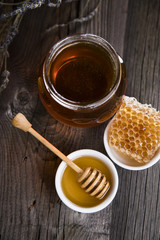 Fresh honey on wooden table