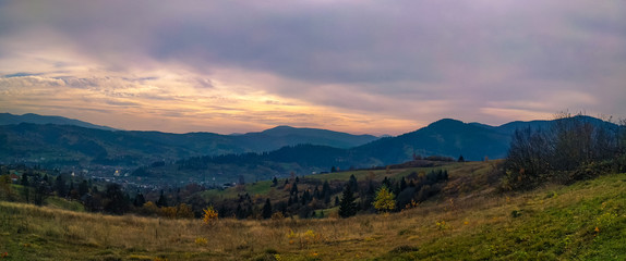 Ukrainian Carpathian Mountains landscape background during the sunset in the autumn season