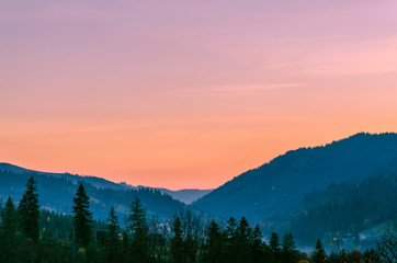 Fototapeta na wymiar Ukrainian Carpathian Mountains landscape background during the sunset in the autumn season