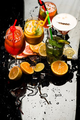 Fruit slice and cocktail glass at bar.