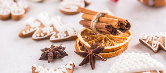Fototapeta na wymiar Cinnamon star anise gingerbread dry orange with christmas decoration