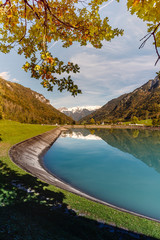 Beautiful reservoir in switzerland in autumn - obrazy, fototapety, plakaty
