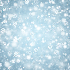 Naklejka na ściany i meble Blue winter background with snowflakes.