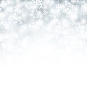 White winter background with snowflakes.