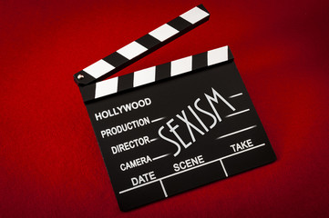 Sexism and sexual harassment in hollywood concept with clapper board representing the movie...