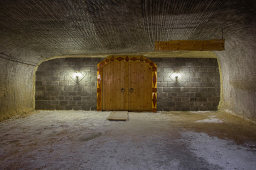 Wooden gate at the underground church in the salt mine shaft
