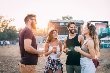 Young people enjoying on the music festival