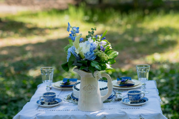 Cake with blue cream for men, decorated with blackberry and blueberry.