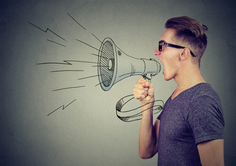 Man screaming in a megaphone making announcement