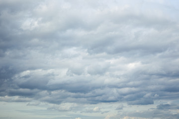 Cloudy sky with black rain cloud background.
