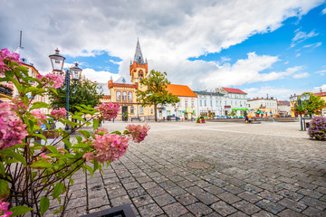 Main city square. Large market square in Swiecie on Vistula with neo-Gothic town hall from 1879.
