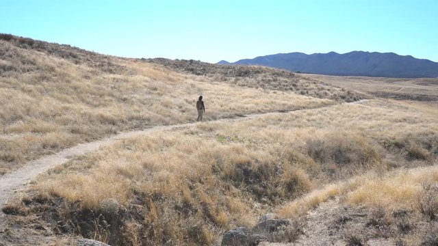 Woman hiking in PCT Trail, Warner Springs, California, United States