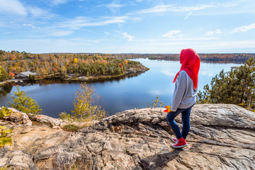 Fototapeta na wymiar A Canadian muslim enjoying view from top of the hill