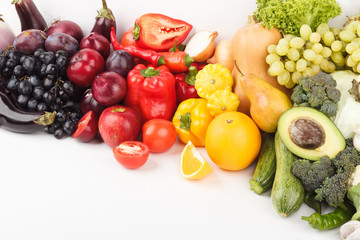 Set of multicolored fresh raw vegetables and fruits, isolated