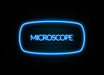 Microscope  - colorful Neon Sign on brickwall