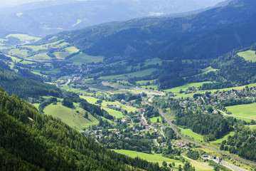 Alpen mountains valley at sunny day