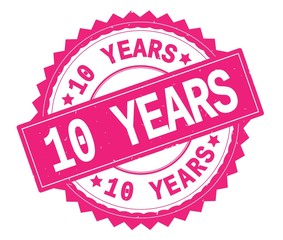 10 YEARS pink text round stamp, with zig zag border.