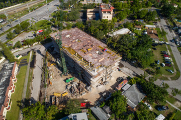 Aerial image of a building under construction with crane