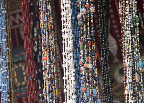 Moroccan bead stall with necklaces hung across it