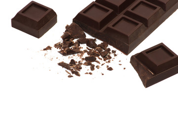 Broken chocolate bar isolated on white