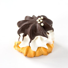 Christmas tree cookies from shortcrust pastry, whipped cream and marshmallows in chocolate isolate on a white background.