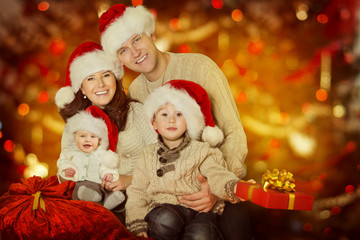 Fototapeta na wymiar Christmas Family Portrait, Happy Father Mother Child and Baby With Present Gift