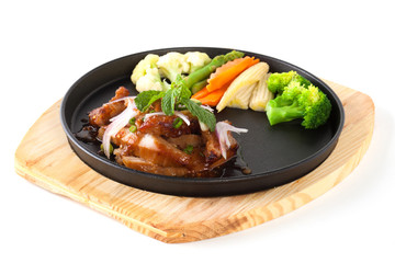 pork neck grill isolated on black plate on white background (Thai style food)