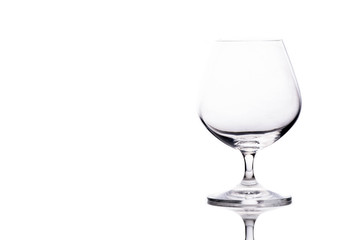 Empty glass of cognac on the table