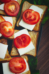 Plate with fresh aperitifs on the table