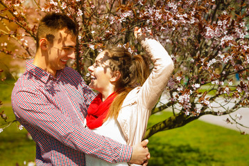 Fototapeta premium Happy couple having romantic date in park