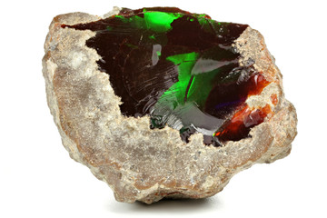 Ethiopian chocolate opal isolated on white background