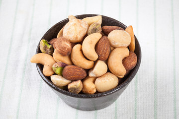 Assorted mixed nuts in bowl on the table