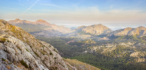 Serra de Tramuntana range panoramic landscape and sea of clouds during sunrise, Majorca Balearic Islands