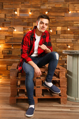 Portrait of a man on a wooden background