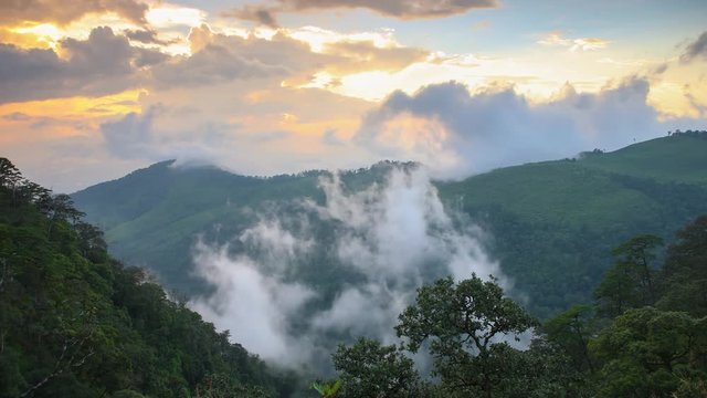 4K timelapse of sunset with mountain view and cloud moving