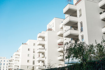 high contrasted white apartment buildings with modern facade