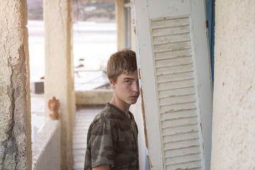 portrait of a young man at a lost place