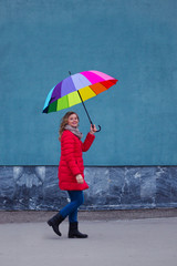 walking woman with colorful umbrella