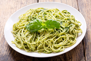plate of pasta with pesto sauce