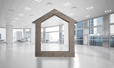 Obraz na płótnie Canvas Conceptual background image of concrete home sign in modern office interior