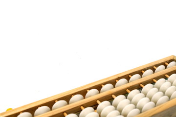 An abacus calculator for background and add text message.is a calculating tool that was in use in Europe, China and Russia, centuries. It are used to teach arithmetic. Education and Financial concept.