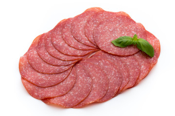 Salami slices isolated on white background.