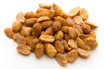 Peeled peanuts on the isolated background.