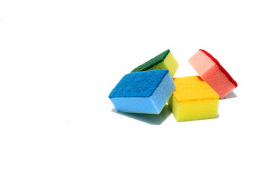 Various color of scouring pad and sponge isolated on white background with add text message. scouring pad and sponge is a cleaning tool used for scouring a surface and cleaning a dishes after cooking.