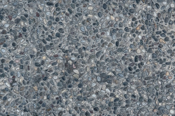 Smooth cobblestones, rock wall texture