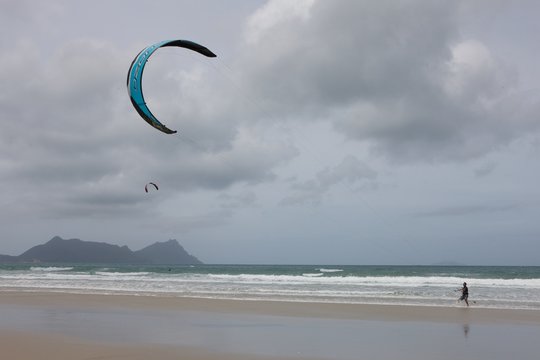 Ruakaka beach New Zealand. Para gliding. Whangarei in the Bream Bay area.