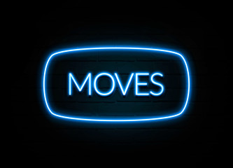 Moves  - colorful Neon Sign on brickwall
