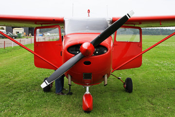 Small private lightweight vintage propeller airplane.